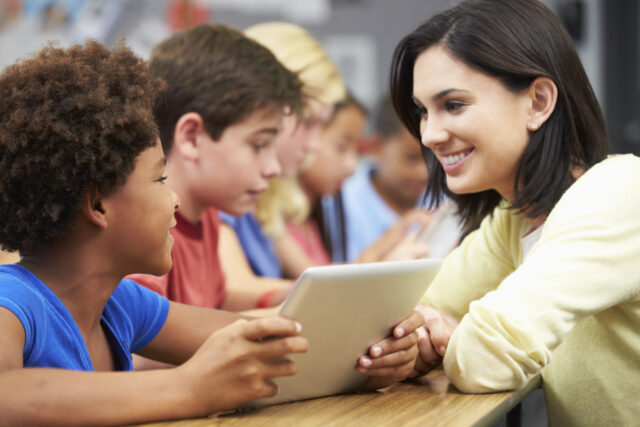 A student is participating in a SEL class with his teacher.